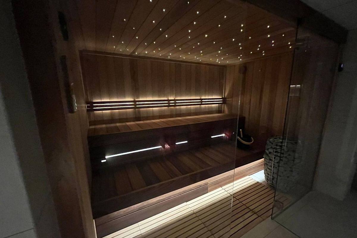 Luxurious wooden sauna with ambient lighting