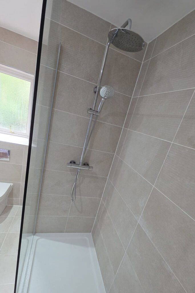 Modern shower with sleek tiles