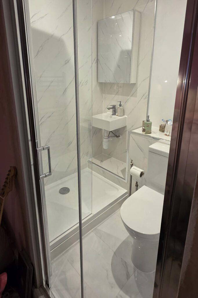 Compact modern bathroom with shower