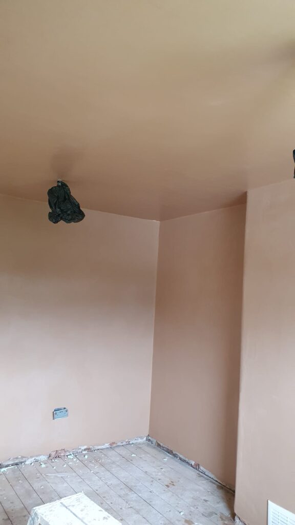 Freshly plastered room with ceiling