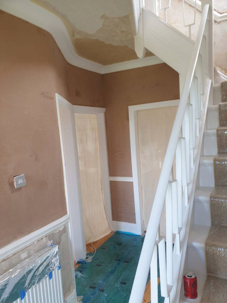 Unfinished plastering in a hallway